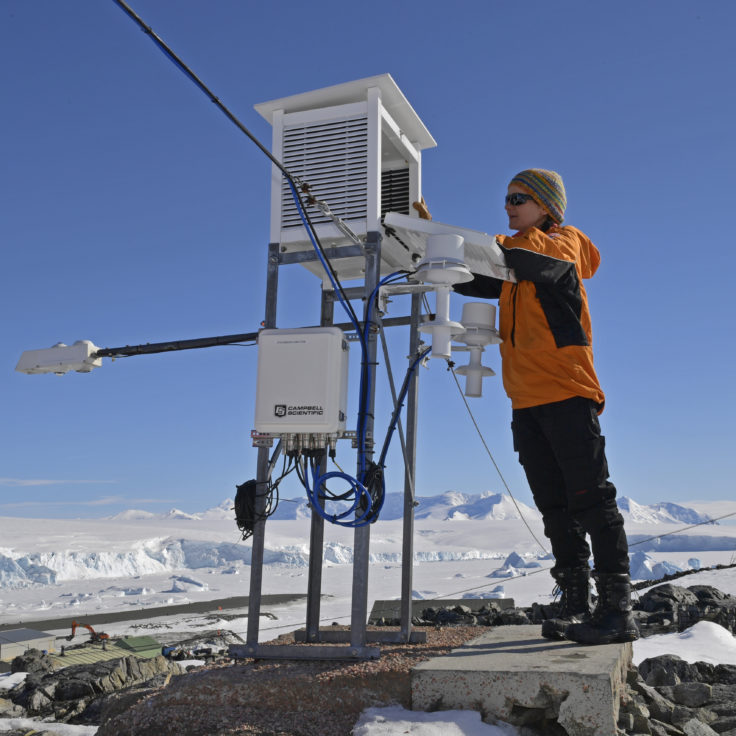 A meteorologist taking measurements