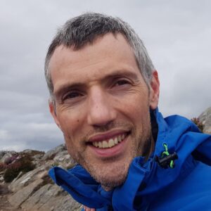 A man smiling for the camera