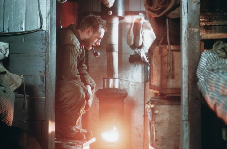 Interior of old Base V hut at View Point, showing confined space, 1956. (Photographer: Hugh Simpson, medical officer; Archives ref: AD6/19/3/D25)