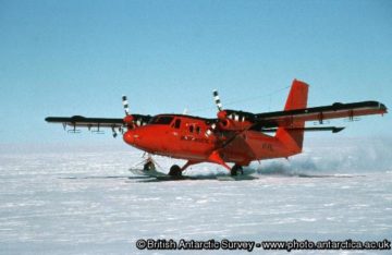 A fighter jet sitting on top of a runway.