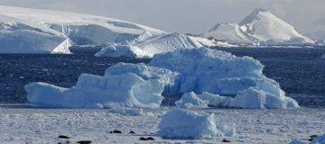 A close up of a snow covered mountain.