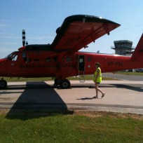 A plane sitting on top of a runway.