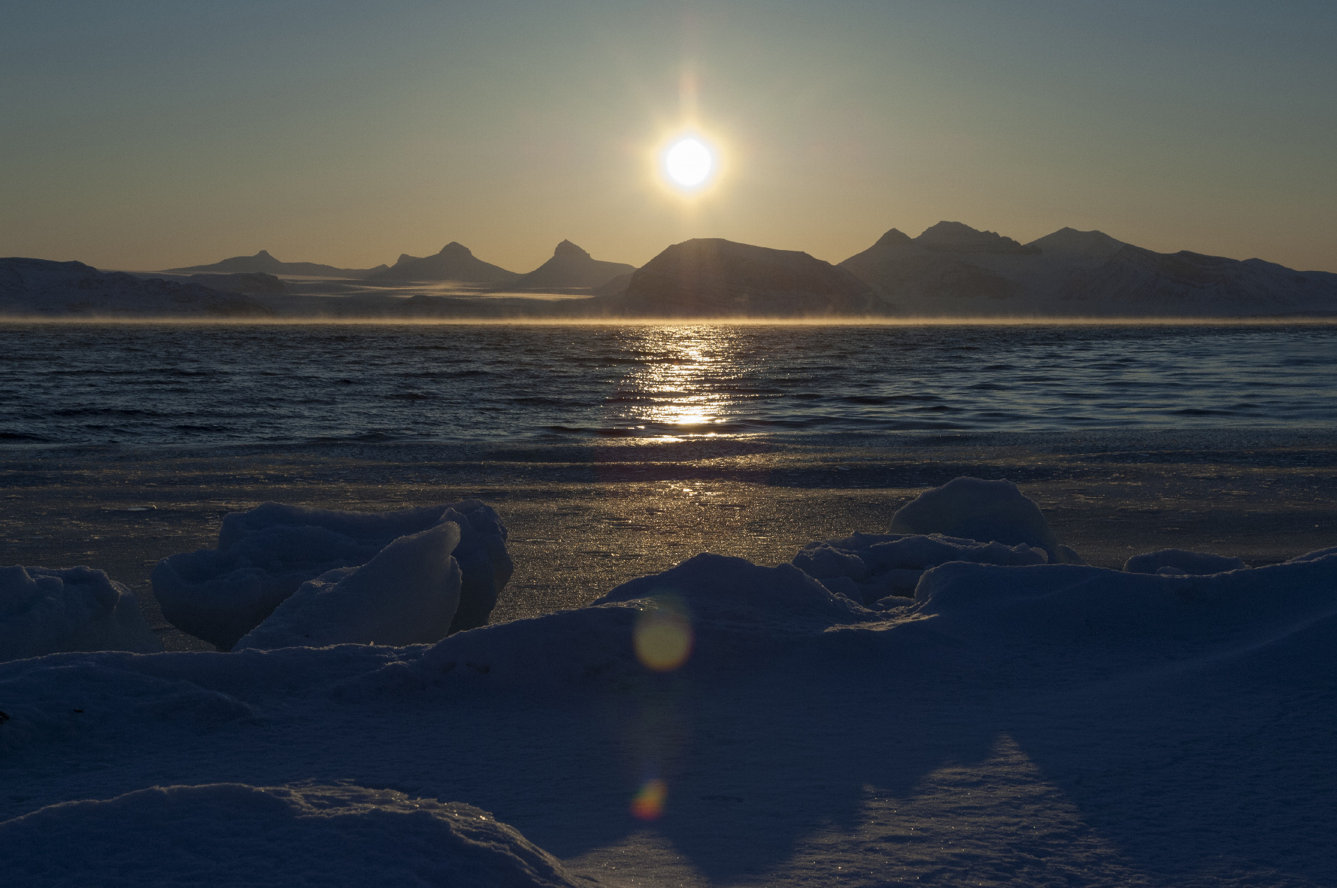 A sunset over a body of water.