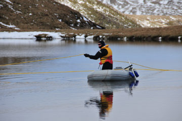 A man in a small boat