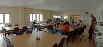 A group of people in a room.