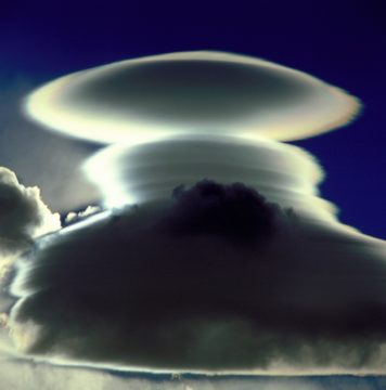 Lenticular clouds at South Georgia, indicating lee-wave generation within the atmosphere. The waves are caused by stratified air flowing over the island. Taken from Barff Peninsula, South Georgia.