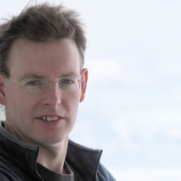 A person smiling for the camera.