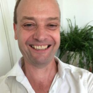 A man smiling for the camera