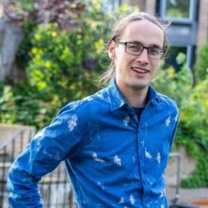 A man in a blue shirt