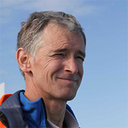 A person smiling for the camera.