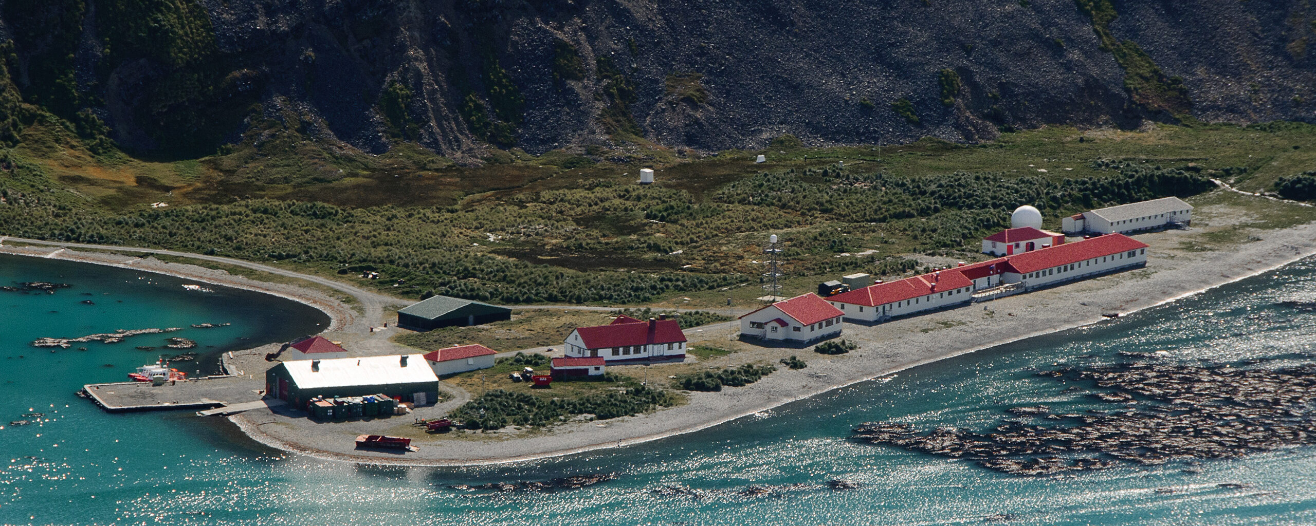 A boat sitting on top of a mountain