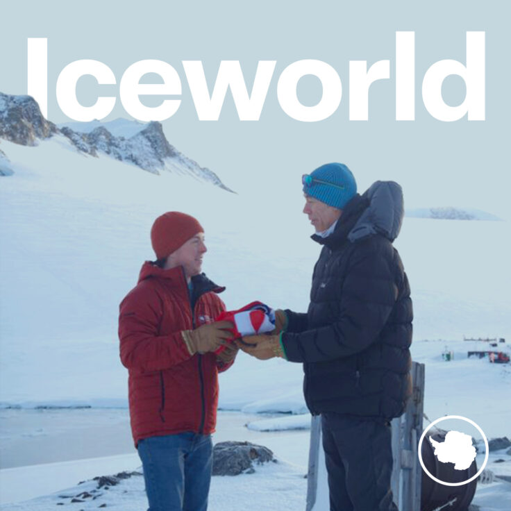 A couple of people that are standing in the snow