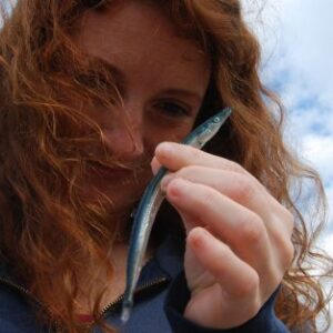 A woman talking on a cell phone.