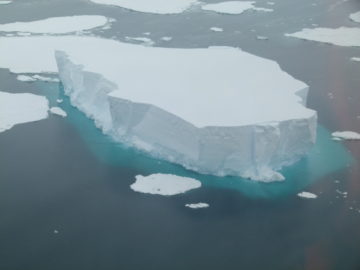 A view of a snow covered mountain.