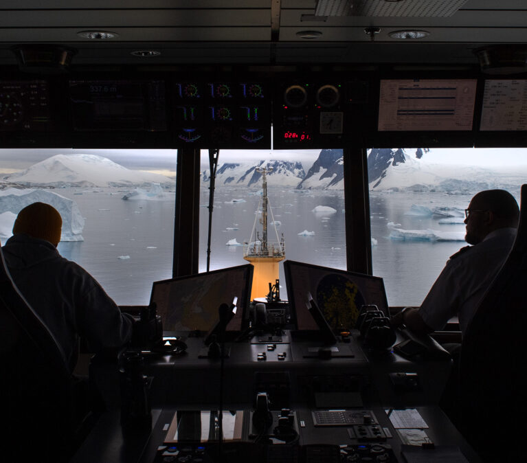 The bridge of the RRS Sir David Attenborough looking out onto icy waters