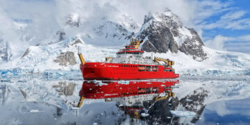 RRS Sir David Attenborough on a perfect day in Antarctica
